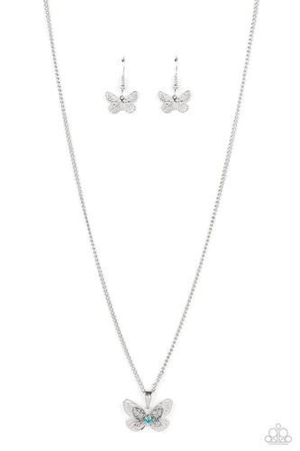 A whimsical 3-D butterfly in a high sheen silver finish elegantly slides along a silver chain. An Aquamarine rhinestone is nestled at the center of the butterfly's wings, adding a hint of sparkle to the design. Features an adjustable clasp closure.  Sold as one individual necklace. Includes one pair of matching earrings.