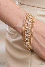 Load image into Gallery viewer, A mashup of gold chains and strands of sparkly white rhinestones stack into irresistibly glitzy layers as they wrap around the wrist. Features an adjustable clasp closure.  Sold as one individual bracelet.  New Kit Fashion Fix
