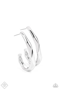 The surface of a J-hook shaped silver hoop is faceted in a flashy finish that reflects and refracts the light for an edgy shimmer. Earring attaches to a standard post fitting. Hoop measures approximately 1" in diameter.  Sold as one pair of hoop earrings.