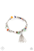 Load image into Gallery viewer, An earthy collection of faceted silver beads, raw cut multicolored rock beads, and cylindrical silver accents are threaded along a coiled wire around the wrist for a grounding pop of color. A shimmery silver chain tassel swings from one end of the spiral, adding a hint of flirtatious movement to the piece.  Sold as one individual bracelet.
