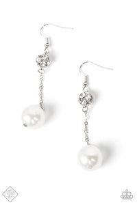 A lusciously oversized pearl is suspended from a dainty silver chain that delicately sways from a brilliant cluster of white rhinestones, making a glamorously elegant lure. Earring attaches to a standard fishhook fitting.  Sold as one pair of earrings.  New Kit Fashion Fix