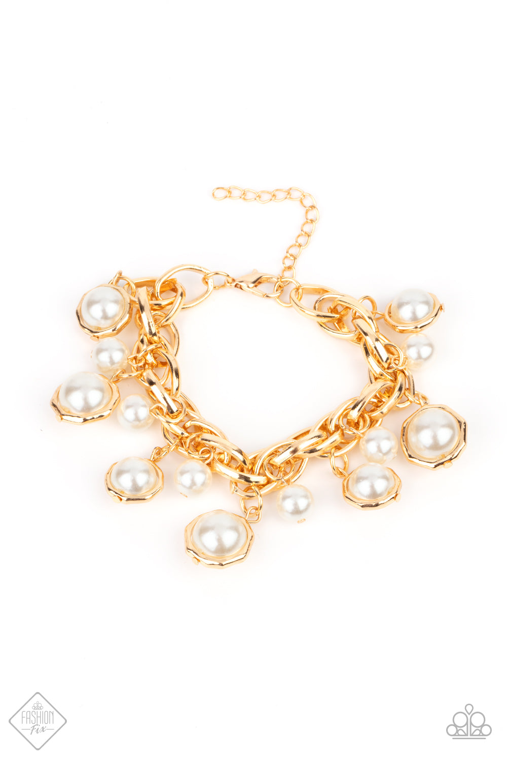 Classic white pearls and solitaire pearls that are threaded along a rod inside imperfect gold rings swing from a chunky double-linked gold chain around the wrist, creating a dramatic fringe. Features an adjustable clasp closure.  Sold as one individual bracelet.