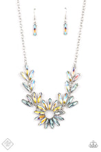 Load image into Gallery viewer, Featuring oblong marquise cuts, a collection of iridescent gems join into leafy frames below the collar. Radiating with the same iridescent intensity, even more stellar rhinestones fan out into a circular focal point, resulting in a celestial centerpiece. Features an adjustable clasp closure. Due to its prismatic palette, color may vary.  Sold as one individual necklace. Includes one pair of matching earrings.  New Kit Fashion Fix
