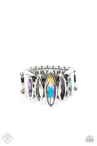 Featuring a stellar iridescence, marquise cut rhinestones alternate with airy silver marquise frames across the finger, coalescing into a futuristic sparkle. Features a stretchy band for a flexible fit. Due to its prismatic palette, color may vary.  Sold as one individual ring.  New Kit Fashion Fix