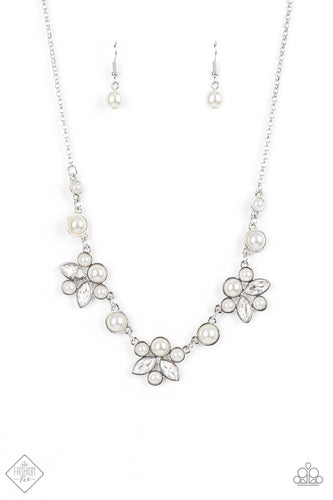 Infused with solitaire pearls, dainty clusters of bubbly white pearls and glassy white marquise style rhinestones delicately gather into clustered frames below the collar for an elegantly timeless finish. Features an adjustable clasp closure.  Sold as one individual necklace. Includes one pair of matching earrings.