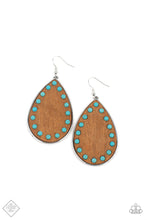 Load image into Gallery viewer, Dainty turquoise stone beads border an earthy wooden teardrop frame that is encased in a sleek silver fitting, creating a whimsical woodsy lure. Earring attaches to a standard fishhook fitting.  Sold as one pair of earrings.  New Kit Fashion Fix
