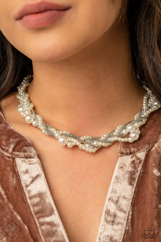 Capped in silver fittings, strands of bubbly white pearls and dainty silver popcorn chains delicately weave below the collar, creating an elegantly effervescent centerpiece. Features an adjustable clasp closure.  Sold as one individual necklace. Includes one pair of matching earrings.