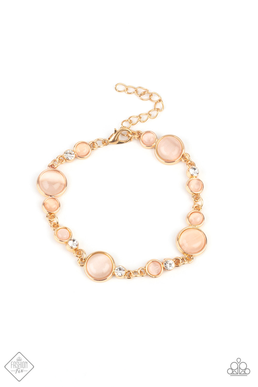 Encased in sleek gold fittings, a bubbly collection of champagne cat's eye stones and glassy white rhinestones coalesce into mismatched frames that delicately connect around the wrist for an effervescent elegance. Features an adjustable clasp closure.  Sold as one individual bracelet.  New Kit Fashion Fix