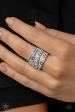 Load image into Gallery viewer, Row upon row of glistening white rhinestones stack into an incandescent display. An additional row of sparkling rhinestones wraps diagonally across the band for an extra splash of refined shimmer. Features a stretchy band for a flexible fit.  Sold as one individual ring.
