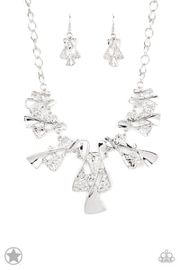 Twisted silver hourglasses dance along a chunky silver chain with tiny clear rhinestones adding sparkling, elegant accents. Beautiful textured pieces add depth to the design. Features an adjustable clasp closure.     Sold as one individual necklace. Includes one pair of matching earrings.