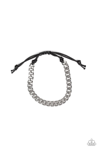 Shiny black cording knots around the ends of a thick silver curb chain that is wrapped across the top of the wrist for a versatile look. Features an adjustable sliding knot closure.  Sold as one individual bracelet.