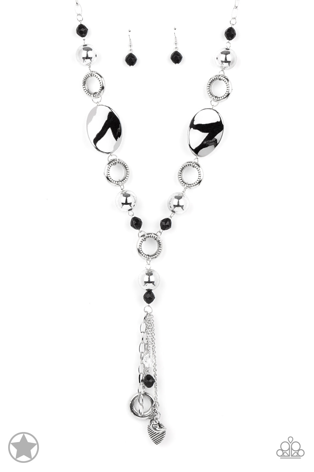 Long chain of black crystalized beads, curved plates of silver with a pearly finish, and chunky silver rings lead down to a tassel of chains and charms, including a crescent moon and a heart.     Sold as one individual necklace. Includes one pair of matching earrings.
