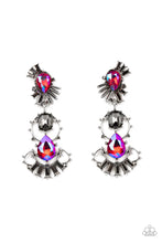 Load image into Gallery viewer, A cosmic collision of iridescent pink teardrop gems and a solitaire smoky emerald cut rhinestone haphazardly adorns studded silver frames. Dotted in round and emerald cut hematite rhinestone accents, the abstract frames stack into a stellar lure. Earring attaches to a standard post fitting. Due to its prismatic palette, color may vary.  Sold as one pair of post earrings.
