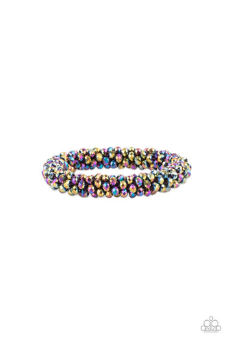 Sparkling with dramatic brilliance, a collection of faceted dainty oil spill beads are threaded along a woven stretchy band creating a stunning statement around the wrist.  Sold as one individual bracelet.