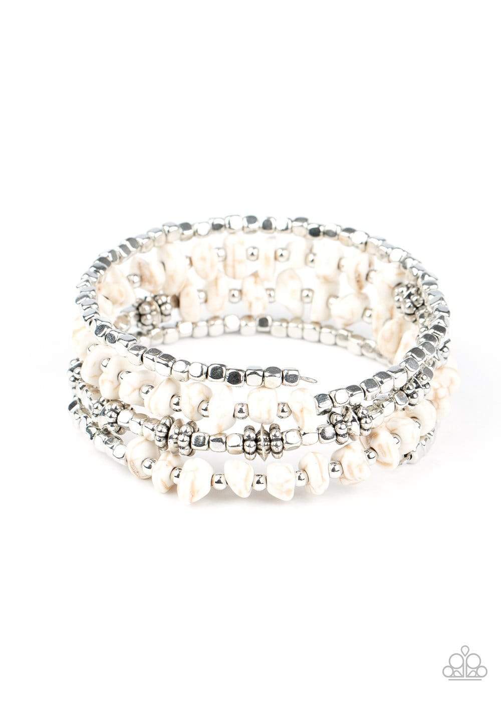 An earthy collision of white stone beads, silver cubes, and decorative silver accents are threaded along a silver wire that coils around the wrist, creating a whimsical infinity wrap bracelet.  Sold as one individual bracelet.