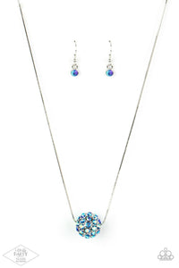 Bedazzled in stellar iridescent rhinestones, a dramatic silver bead slides along a sleek silver chain below the collar for a statement-making look. Due to its prismatic palette, color may vary. Features an adjustable clasp closure.