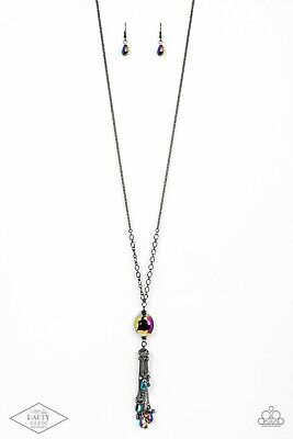 Featuring an oil spill finish, a faceted oil spill gem attaches to the bottom of a lengthened gunmetal chain featuring sections of airy chain links. Infused with dainty gunmetal and matching oil spill beads, shimmery gunmetal chains stream from the bottom of a hematite dotted cap, creating an edgy tassel. Features an adjustable clasp closure.  Sold as one individual necklace. Includes one pair of matching earrings.