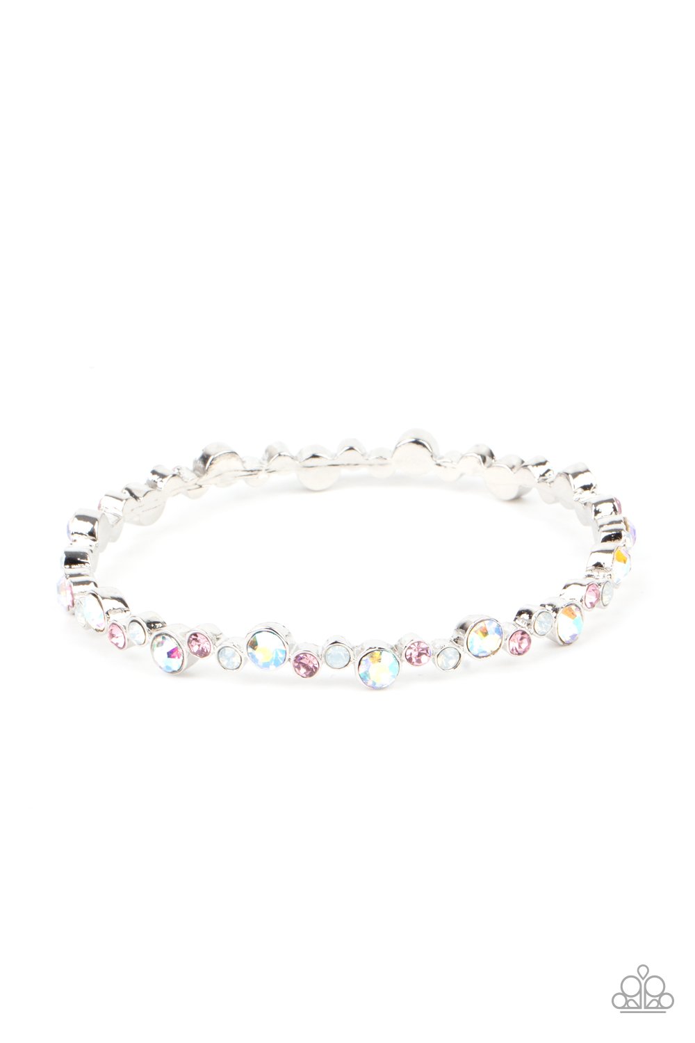 Encased in sleek silver fittings, a twinkly collection of dark pink, iridescent, and white rhinestones coalesce into a glittery bangle around the wrist.