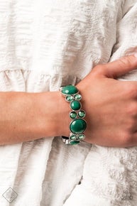 Infused with pairs of Ultramarine Green rhinestones, mismatched Ultramarine Green beaded silver frames are delicately threaded along stretchy bands around the wrist for a whimsical pop of color.